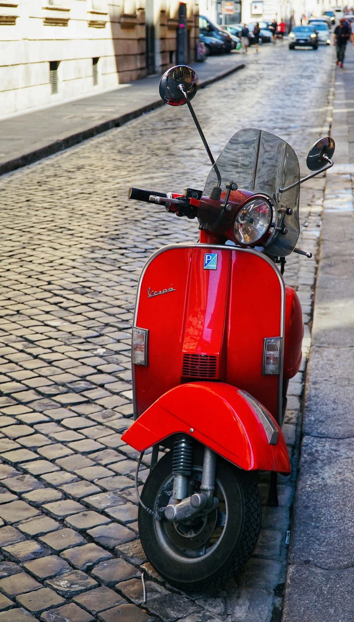 A scooter on a Roman street